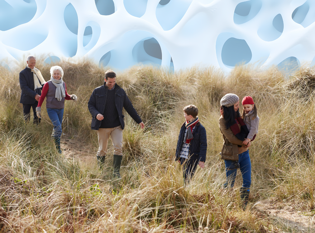 A representative picture of bone health through the lifespan, a family walking together